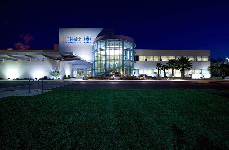 UF Health Proton Therapy Institute exterior in the evening