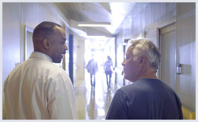 UF Health Proton Therapy Institute doctor consulting with patient