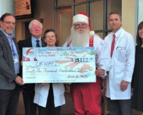 Santa Joe Delivers Donation for Children